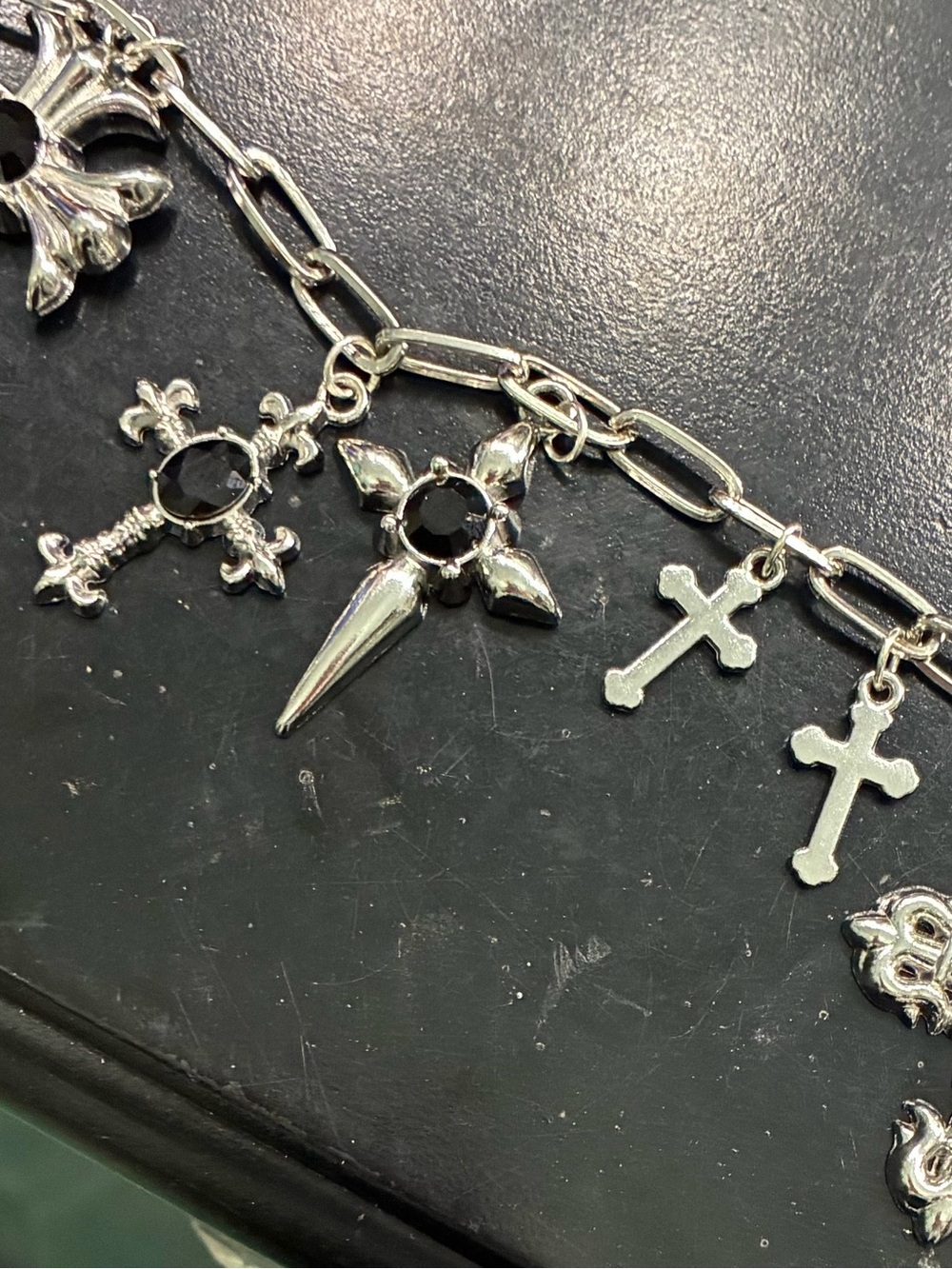 Silver-tone Cross Charm Bracelet with Black Stones